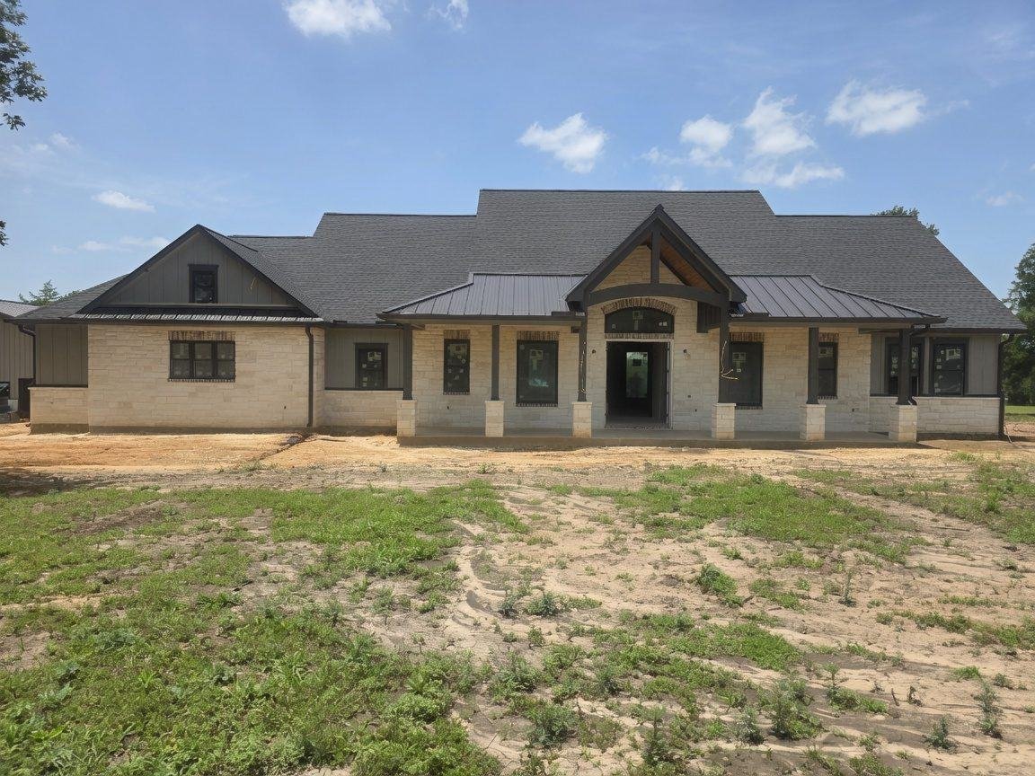 Finished natural stone facade on a new home in Chappell Hill, TX